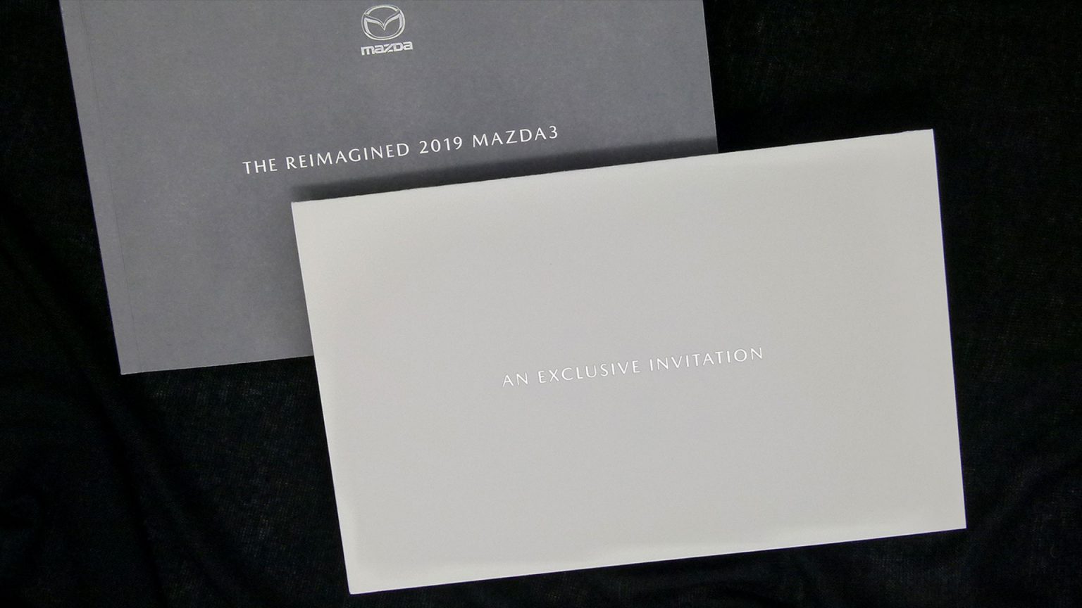 The soft-yet-chunky invitation featured a subtle Silver foil on the cover.